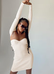 side view of model wearing Princess Polly Hellie Mini Dress Cream Sweetheart Neckline 