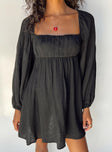 Front view of model wearing  front Princess Polly Square Neck  Let's Dance Mini Long Sleeve Dress Black