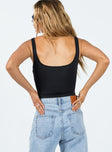 back view of model wearing Princess Polly Halse Bodysuit Black Sleeveless Square Neck 