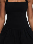 back view of model wearing Princess Polly Gigli Bubble Hem Mini Dress Black Tall Square Neck 