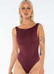 front view of model wearing Princess Polly Coomba Backless Bodysuit Burgundy Sleeveless Scoop Neck 