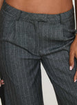 side view of model wearing Princess Polly Broadcast Pants Grey Pinstripe Low Rise Pants 