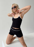 Front view of model wearing  front Princess Polly Sleeveless High Neck  Airdrie Contrast Halter Top Black / White