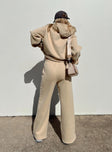 Front view of model wearing  front Princess Polly  Kaiden Straight Leg Track Pant Beige