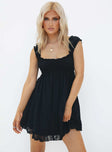 Front view of model wearing  front Princess Polly Square Neck  Carlita Mini Dress Black