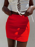 Front view of model wearing  front Kael Mid Rise Mini Skirt Red Princess Polly  Mini Skirts 