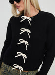 front view of model wearing Princess Polly Rosalee Cardigan Black / White Cropped 