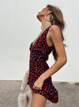 Front view of model wearing  front Princess Polly Asymmetric Neckline  Nellie Mini Dress Black / Red Floral