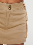 side view of model wearing Princess Polly Superia Cargo Skort Taupe High Waisted Shorts 