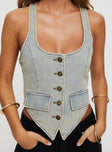 front view of model wearing Princess Polly Nyc Denim Halter Top Light Wash Sleeveless Scoop Neck 