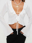 front view of model wearing Princess Polly Gylda Long Sleeve Top White Full Sleeves Plunger 