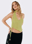 Front view of model wearing  front Princess Polly Sleeveless Square Neck  Rendezvous Halter Top Lime