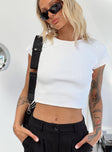 Front view of model wearing  front Princess Polly Short Sleeves Square Neck  Classic Crop Tee White Tall