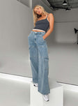 Front view of model wearing  front Princess Polly Mid Rise  Tamba Cargo Jeans Denim