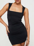 Front view of model wearing  front Princess Polly Square Neck  Manon Mini Dress Black