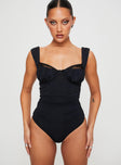 Front view of model wearing  front Princess Polly Sleeveless Sweetheart  Weller Bodysuit Black