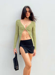 Front view of model wearing  front Princess Polly Full Sleeves Asymmetric Neckline  Nowell Long Sleeve Top Green