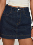 front view of model wearing Princess Polly Heuston Denim Skort Dark Wash High Waisted Shorts 