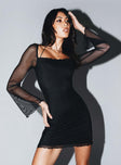 Front view of model wearing  front Princess Polly Boat Neck  Bilbao Long Sleeve Mini Dress Black