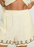 back view of model wearing Princess Polly Jamari Linen Blend Shorts Cream / Brown High Waisted Shorts 