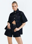 Front view of model wearing  front Whitaker Shorts Dark Denim Princess Polly High Waisted Shorts 