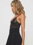 side view of model wearing Princess Polly Enchanta Lace Bodysuit Black Sleeveless Plunger 