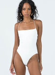 front view of model wearing Princess Polly Karlah Bodysuit White Sleeveless Square Neck 