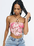 Front view of model wearing  front Princess Polly Sleeveless Square Neck  Sharna Bustier Top Pink Floral