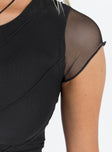 Front view of model wearing  front Princess Polly Sleeveless Asymmetric Neckline  Mateo Top Black