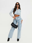 Front view of model wearing  front Princess Polly High Waisted  Belgrove Cargo Jeans Snow Wash Denim