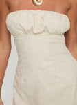 side view of model wearing Princess Polly Luvstruck Strapless Mini Dress Beige Straight Neck 