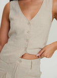 Front view of model wearing  front Princess Polly Sleeveless V-Neck  Sofi Vest Top Beige