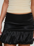 back view of model wearing Princess Polly Ravioli Bubble Hem Mini Skirt Black Mini Skirts 