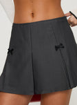 back view of model wearing Princess Polly Little Bow Peep Mini Skirt Grey Mini Skirts 