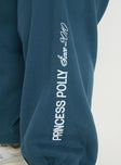 front view of model wearing Princess Polly Princess Polly Track Pants Block / Cursive Text Slate Curve 