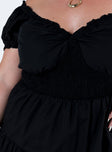 Front view of model wearing  front Princess Polly Sweetheart Neckline  Daniela Mini Dress Black Curve