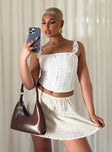 Front view of model wearing  front Princess Polly Sleeveless Square Neck  Hampden Top White