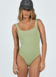 front view of model wearing Princess Polly Cressbrook Square Neck Bodysuit Sage Sleeveless Square Neck 