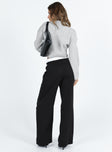 Front view of model wearing  front Princess Polly High Waisted Pants  Lacro Pants Black