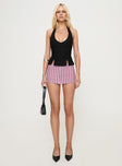 front view of model wearing Princess Polly Childers Halter Top Black Sleeveless Plunger 