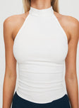 back view of model wearing Princess Polly Merril Halter Top White Sleeveless High Neck 