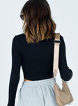 Front view of model wearing  front Princess Polly Full Sleeves Square Neck  Blanco Top Black