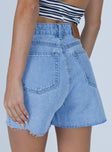 back view of model wearing Princess Polly Laurena Denim Shorts High Waisted Shorts 