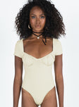 front view of model wearing Princess Polly Mesha Bodysuit Beige Short Sleeves Sweetheart 