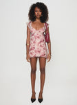 side view of model wearing Princess Polly Trigg Mini Dress Pink Floral Plunger 