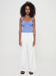 front view of model wearing Princess Polly Dalma Twist Top Blue Sleeveless Plunger 