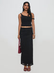   side view of model wearing Princess Polly Mastermind Ruched Maxi Skirt Black Maxi 