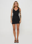 side view of model wearing Princess Polly Nilsson Mini Dress Black V-Neck 