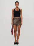   side view of model wearing Princess Polly Tejano Mini Skirt Leopard Mini Skirts 