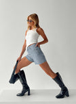 side view of model wearing Princess Polly Laurena Denim Shorts Lower Impact High Waisted Shorts 